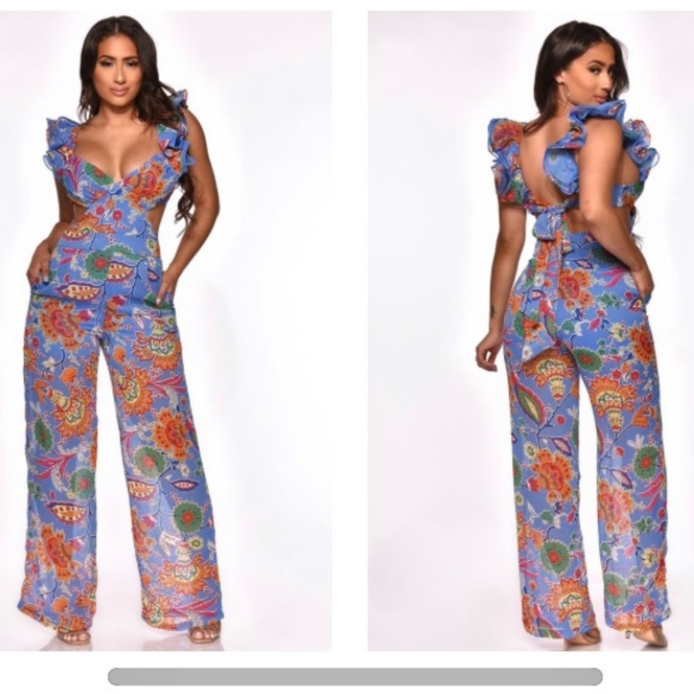 The Boutique blue ruffle sleeve cutout jumpsuit